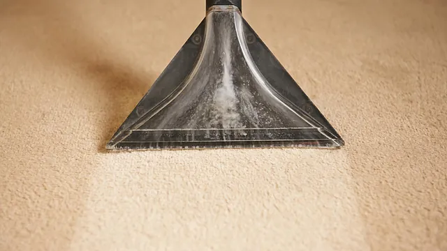 A carpet being cleaned by out team