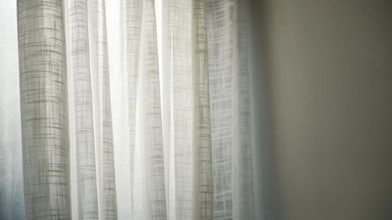 A curtain that has recently been cleaned by our team